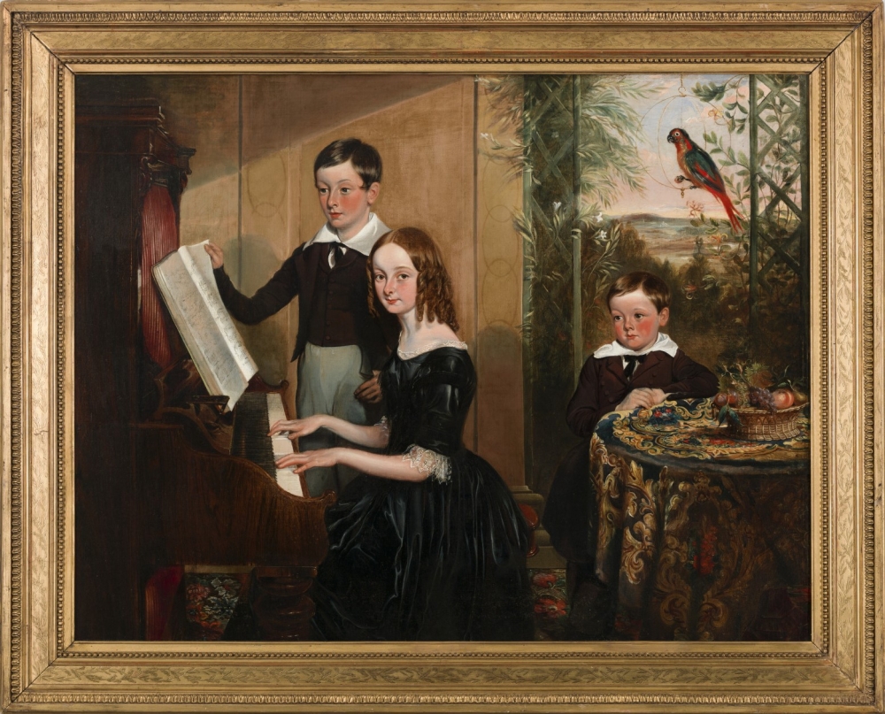 Interior scene showing a boy and girl at a piano and a boy standing near a multi-colored floral print tablecloth upon which sits a basket of fruit. Above him, a parrot stands in a ring, holding a grape in its talons.