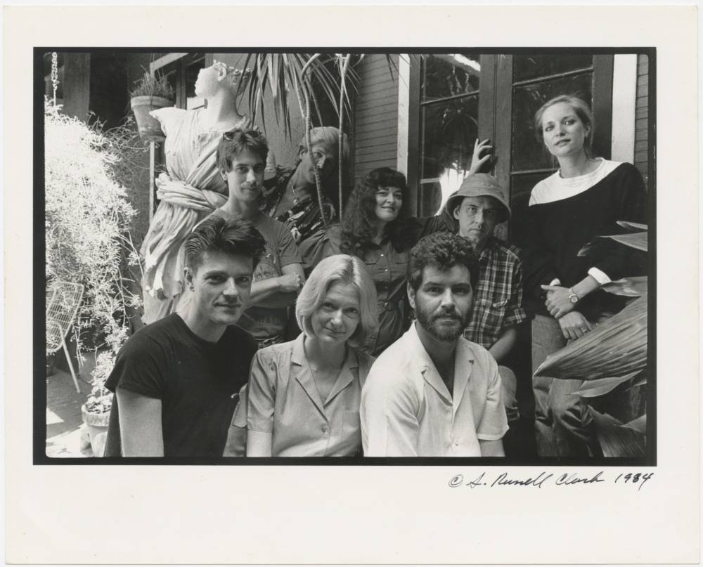 Black-and-white photo of seven artists. 