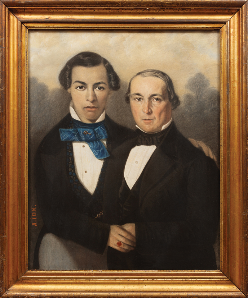 Full view of ca. 1845 double portrait by Jules Lion featuring a son and father. The son (left) stands next to his father, who is seated. Both men are elegantly dressed and appear to be an in affectionate embrace. The son has a fashionable blue cravat around his neck and wears a ring with a red stone or jewel. The photograph of this portrait was provided by Neal Auction Company.