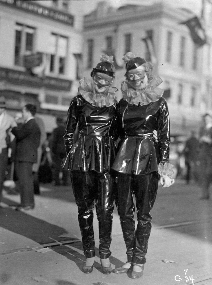 Taken by Charles L. Franck Photographers, this 1934 black-and-white image shows two women wearing matching harlequin costumes for Mardi Gras.